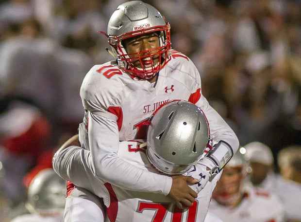 Maurice Bellan and Daniel Jeffrey celebrated a huge upset victory for St. John's Saturday over Gonzaga.
