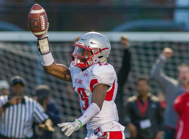 DJ Brown celebrates a touchdown for St. John's.