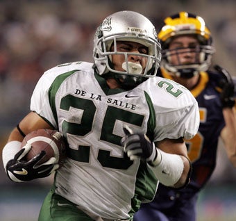 Eduardo Lopez was a 1,000-yard rusher for the Spartans,
who began to pick up steam as the season went forward.