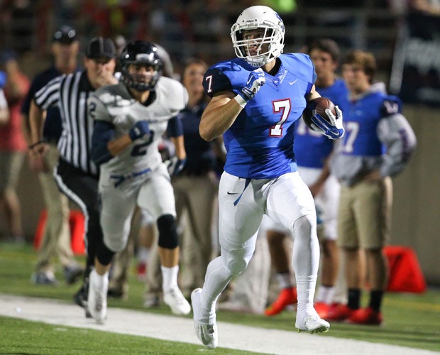 Allen (Texas) running back David Feliciano sprints down the sideline while scoring a touchdown against Flower Mound.