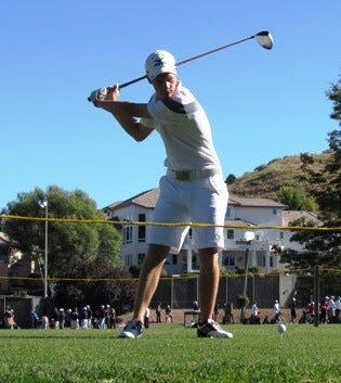 Grant Olinger won the Class 5A boys golf title despite
trailing by seven strokes entering Day 2 of the event.
