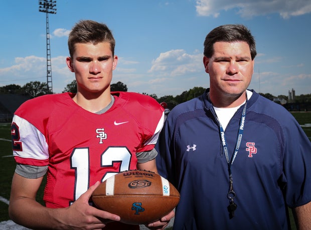Tyler Pogue and his father Lance Pogue pose together as part of the MaxPreps Early Contenders series. The coach's son will look to eventually come back from a knee injury this season.