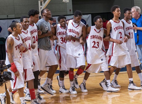 Olympic celebrates a hard-fought victory over Mount Tabor in last Saturday's regional final.