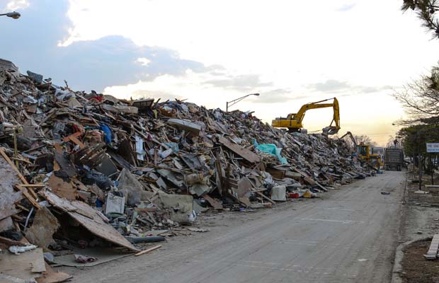 The weeks after the storm featured large mounds and blocks of bulldozed rubble. The eye of Sandy reminded some of Katrina, Afghanistan and war zones. Homes were flooded with water and dead fish, covered with sand and shells. "It was a nightmare that came true," said one player.