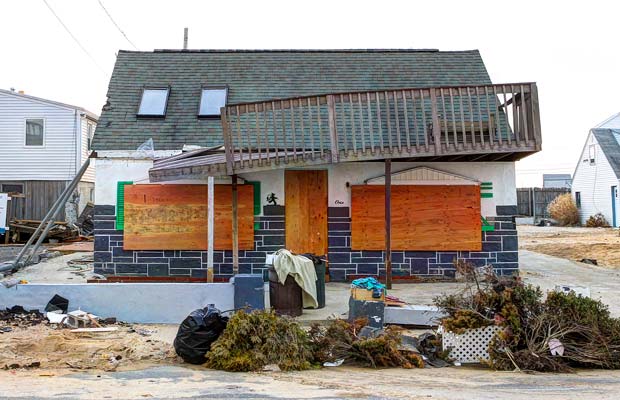 Broken and tattered homes stood throughout the community, but spirits — aided largely by the football team — began to rebuild.