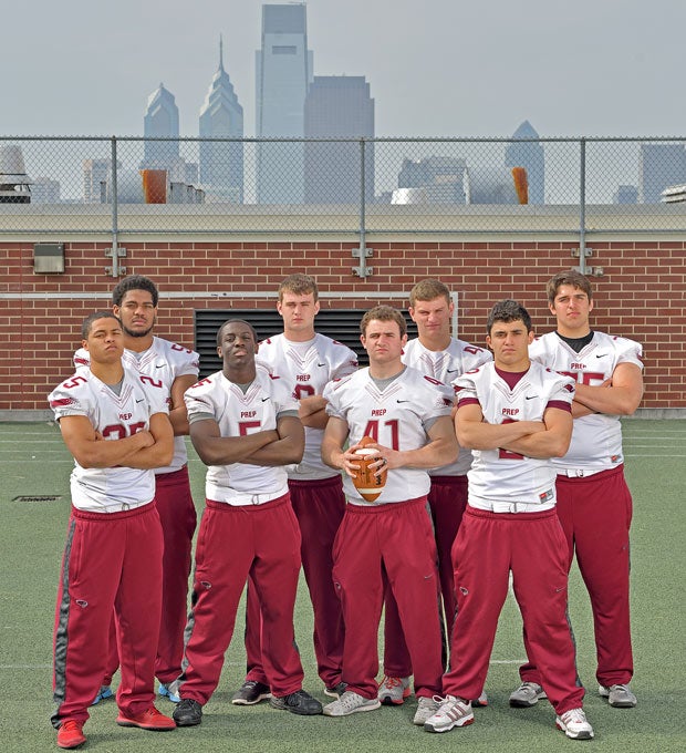 With the Philadelphia sykline in the background, several top players for St. Joseph's Prep pose on the rooftop of the school including (front row left to right) John Reid, Olamide Zaccheaus, Dillon Deiuliis, Thomas Johnson; (back row) Shane Davis, Jack Clements, Jake Strain and Jon Runyan Jr.