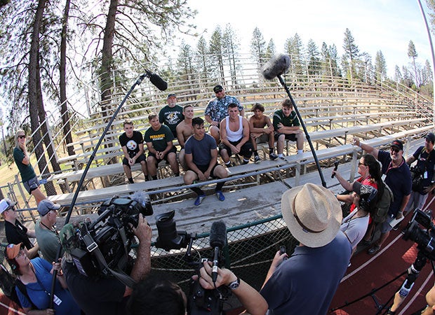 Players and coaches from Paradise take questions from the media after practice on Thursday. 