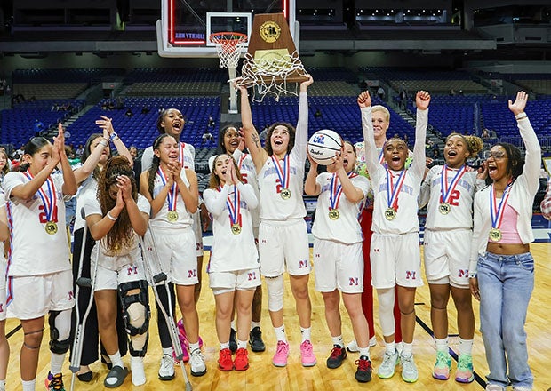 In addition to piling up points, Aaliyah Chavez (center, with trophy) led Monterey to a state title in Texas. (PHOTO: Robbie Rakestraw)