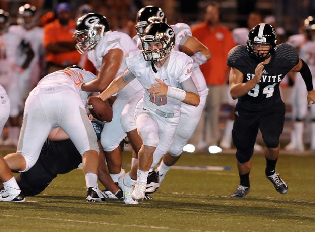 Bishop Gorman Tate Martell (18) sophomore quarterback saved the day Friday for the Gaels with his arm and feet in a thrilling 43-42 win over Centennial.