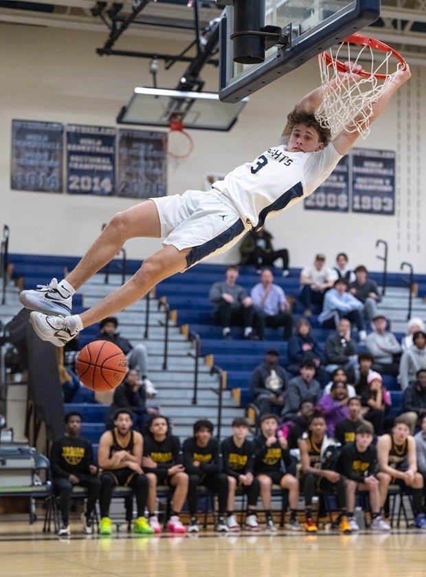 Pittsford Sutherland senior and Providence lacrosse recruit Luke Fliss shows he can he can fly on the basketball court as well.  (Photo: Dennis Joyce)