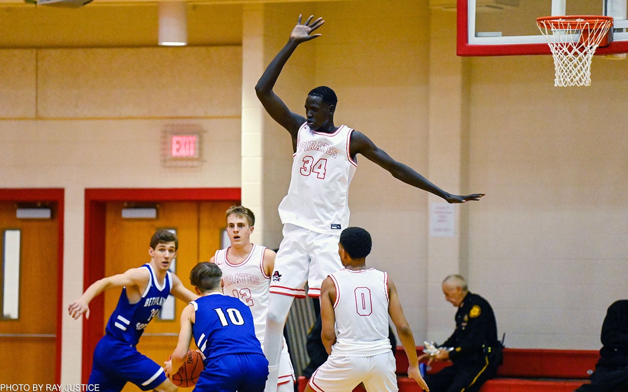 High school basketball: At 7-foot-3, Bol Kuir stands tall for tiny Belfry  on the far east border of Kentucky