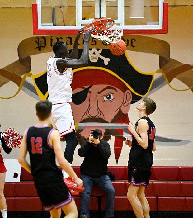 Bol finishes a dunk.