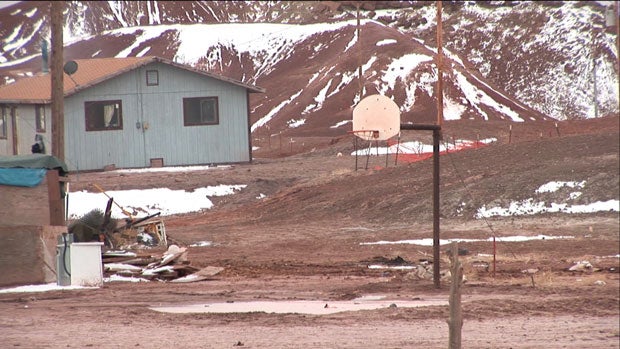 In Chinle and surrounding Navajo Nation towns and communities, basketball hoops are in virtually every back yard.