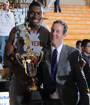 Kevin Boyle and Dakari Johnson enjoy a title
moment.