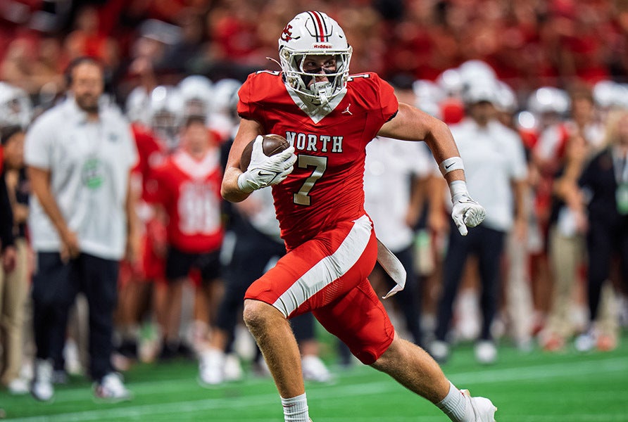 North Gwinnett tight end Max Patterson looks for a big gain during Friday's 37-22 upset win over Grayson. (PHOTO: Luke Hamilton)