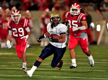 Darren Walker and his taped ankle willed St. John Bosco to a quality victory over Mater Dei Friday night, and in the process grabbed sole possession of first place in the Trinity League.