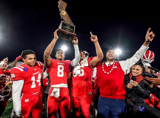 Mater Dei, seen raising their CIF Open Division trophy in 2021, has won four national titles (2017, 2018, 2020, 2021) in the past six seasons. (Photo: Louis Lopez)
