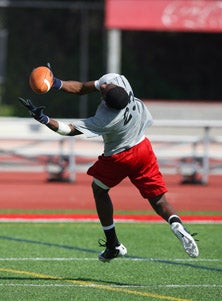 Wide receiver Dittrich Bunton makes
a superb adjustment on a pass.