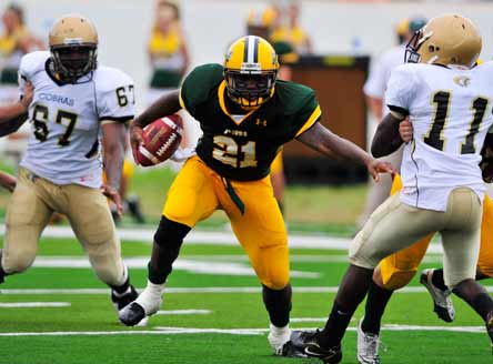 Kelvin Taylor, son of NFL player Fred Taylor, plays for a small school, leading some to say his stats are inflated. Others believe that he would be a star at any level.