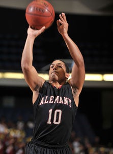 Alemany's Max Guercy leads his
team into the state Division III
championship game.