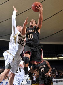 Alemany's Max Guercy is relentless
to the hoop.