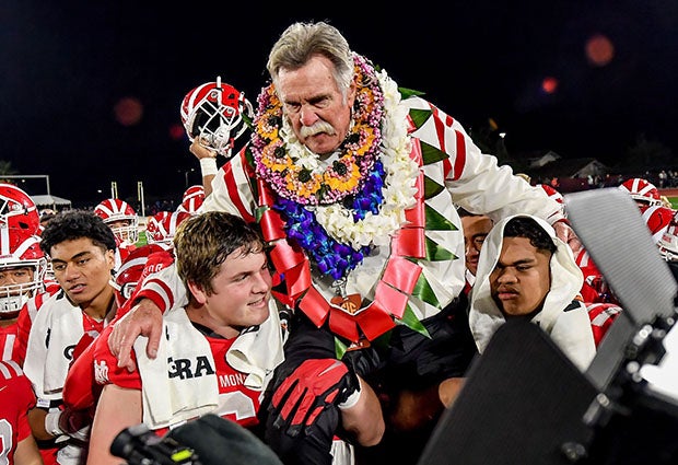 Bruce Rollinson is carried off the field following last year's CIF Open Division state championship game. (Photo: Louis Lopez)