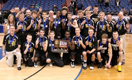 Perham holds up the magic No. 3 while celebrating first state title.
