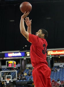 Kevin Payne makes one of his two late
3-pointers keying a state title for
Lutheran.