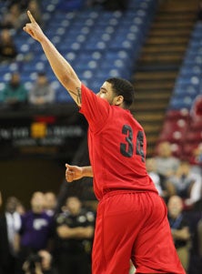 Kevin Payne points to the heavens
following one of his 3-pointers.