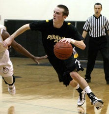 Zach Gabbard was Perham's leading
scorer before collapsing to the
floor on Jan. 20 with heart ailment.