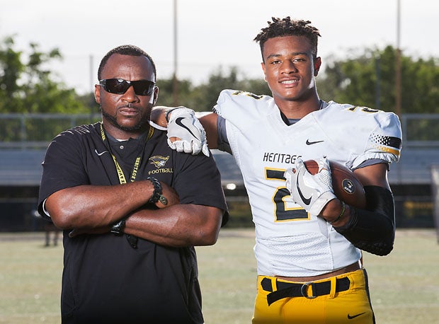 Patrick Surtain (left) poses with his son Patrick Surtain II in 2017.