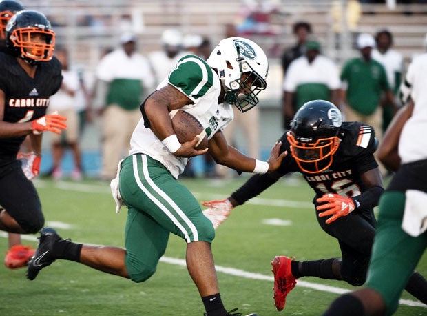 Miami rivals Carol City and Central battle during a tough 2019 contest.  