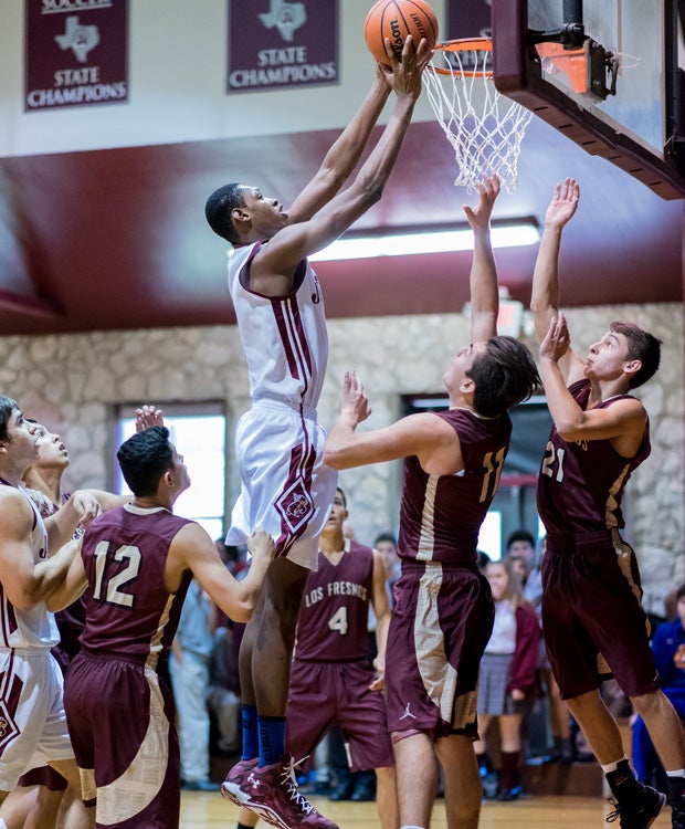 Charles Bassey is shown in action during a game Thursday in the St. Anthony Tournament. 
