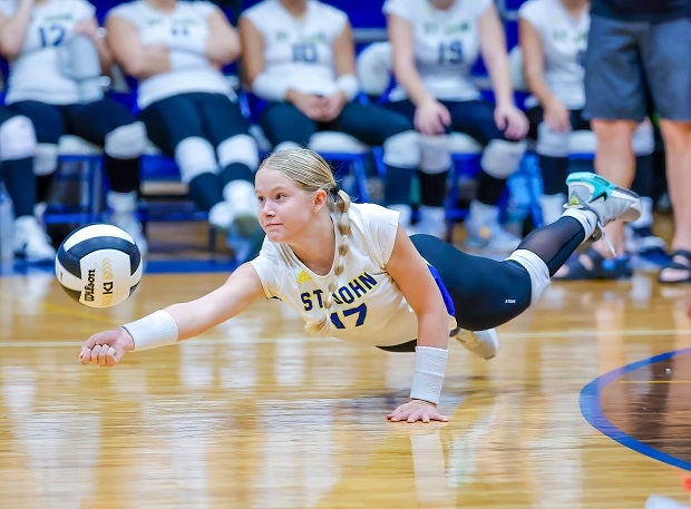 St John Lutheran player Ashley Downs goes all out for a dig in the first set of a sweep of Seven Rivers Christian. (Photo: Chris M. Spears)
