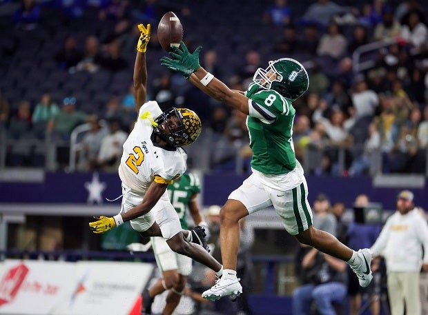 Malakoff’s Chauncey Hogg and Franklin’s Devyn Hidrogo battle for the ball during the Texas 3A Division 1 state final at AT&T Stadium. Malakoff beat Franklin 14-7. (Photo: Robbie Rakestraw)