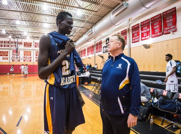 Chol Marial talks with a coach at Cheshire Academy.