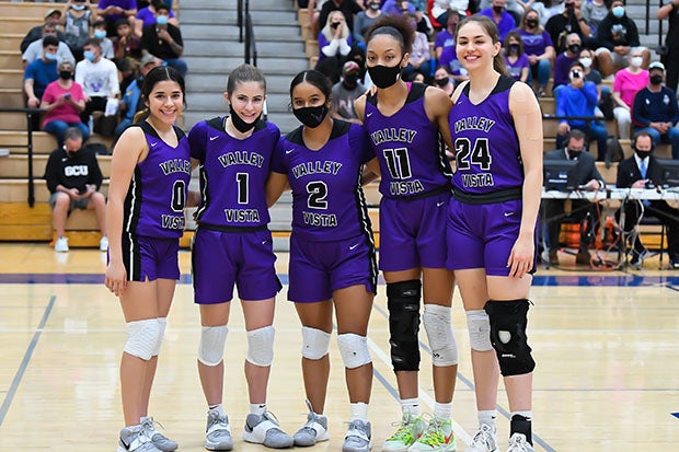 Marisa Davis (11) with teammates prior to the Class 6A state championship game.