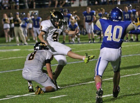 Jenni Goethe kicks the gamewinning field goal in overtime for Tecumseh.