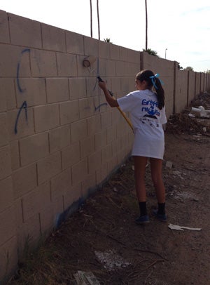 Gameros' first experience with volunteering came
in graffiti removal.
