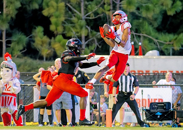 Ryan Williams rises for a catch against Spanish Fort last fall during his final season at Saraland. He caught six passes for 138 yards and two touchdowns in this outing. (Photo: Ted Melton)