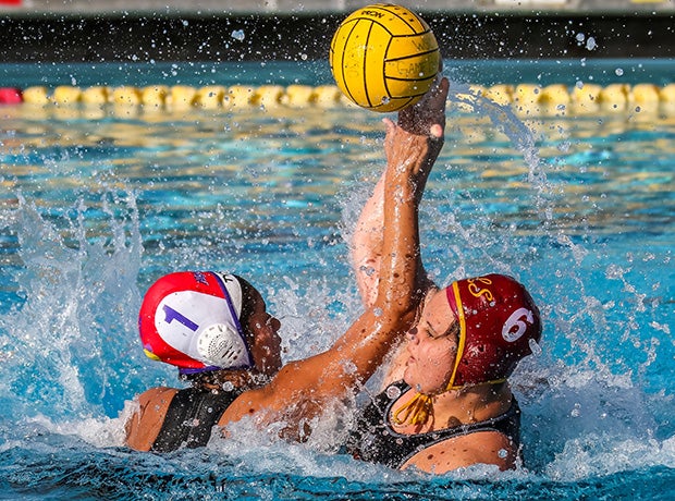 Righetti (Calif.) keeper Sophia Reyes (left) comes out of goal to defend on a shot by a La Serna player during the Bonita Tournament.