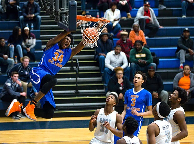 East St. Louis (lll.) forward Terrance Hargrove finishes a monster dunk against Belleville East.