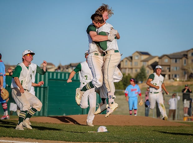 Drew Stahl and Zach Paschke of Mountain Vista (Colo.) celebrate Paschke's extra-inning, walk-off hit on Senior Night against Heritage.