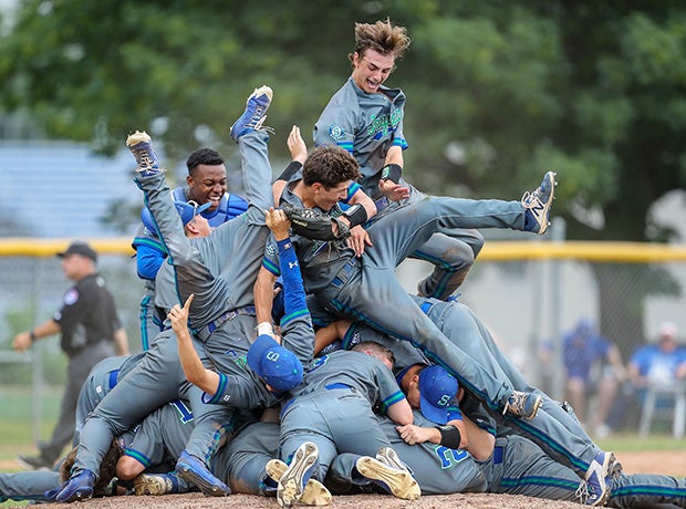 Players on Blue Springs South (Mo.) celebrate their victory over Liberty in the MSHSAA Class 5 quarterfinal playoff game.