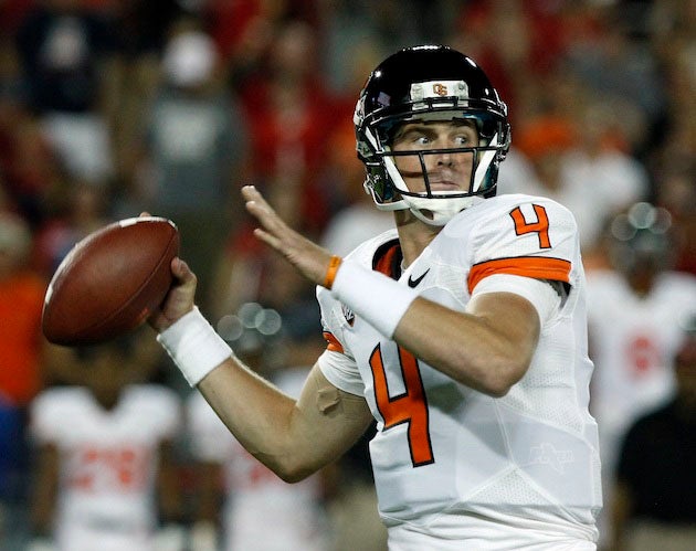Oregon State quarterback Sean Mannion is enjoying a junior season worthy of Heisman Trophy consideration the same season his father John Mannion hopes to lead Silverton High School to a historic Oregon 5A state championship.