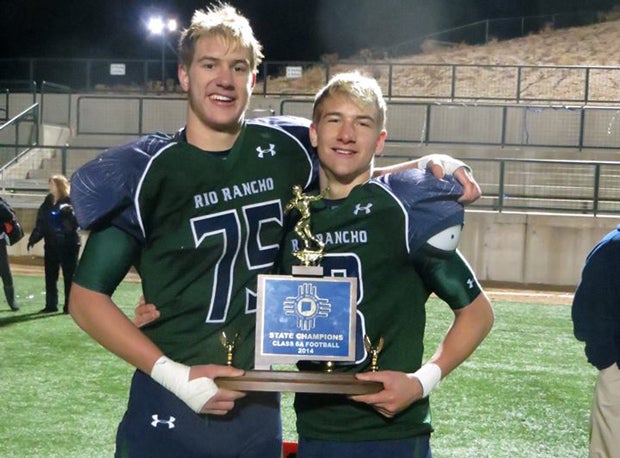Grant Hermanns, left, and his brother Gregg after winning a state title last season.