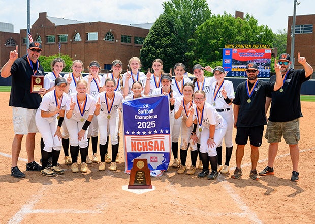 West Wilkes celebrates after sweeping North Lenoir  9-1 and 3-2 for North Carolina's Class 2A state championship. The Blackhawks finished 27-3 and won 21 in a row to end the season. (PHOTO: Brad Arrowood)