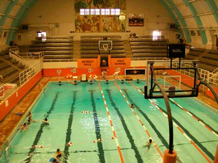 The Swim Gym at Beverly Hills High School hosts sports that don't seem to go together: Swimming/water polo and basketball/volleyball. Large motors push two halves of the wood floor over the pool. The gym is just one of a handful of America's unique high school sports venues.