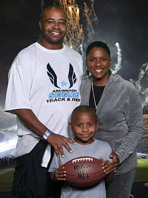 Carlos Lynn with wife Antwanette and son Caleb.