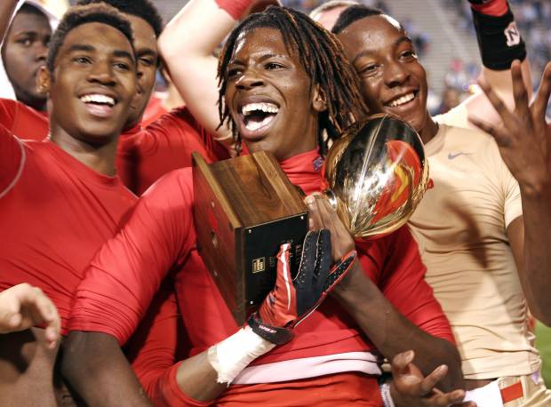 Lafayette, shown here celebrating a 2010 title, has a new coach to help keep its streak alive.